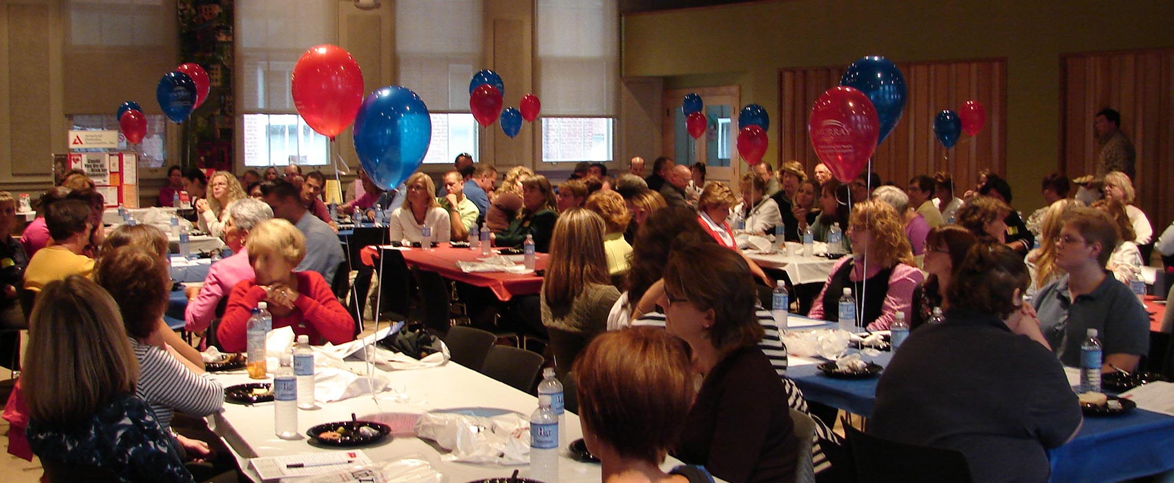 Employee owners at a luncheon event